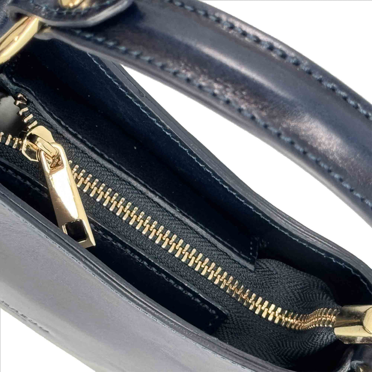 Isotta S - Mini sac demi-lune en cuir bleu