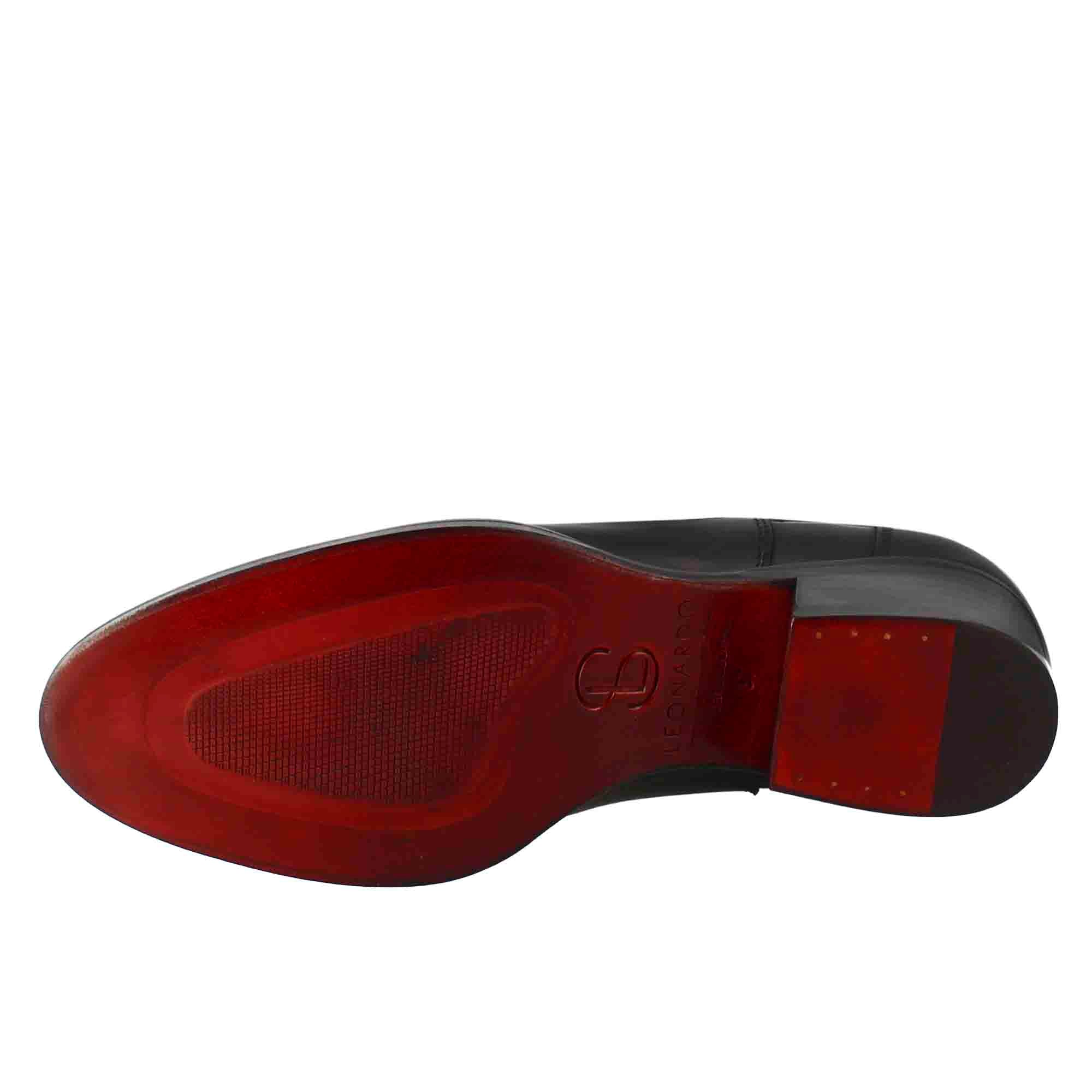 Bottine Chelsea lisse à talon moyen pour femme en cuir noir