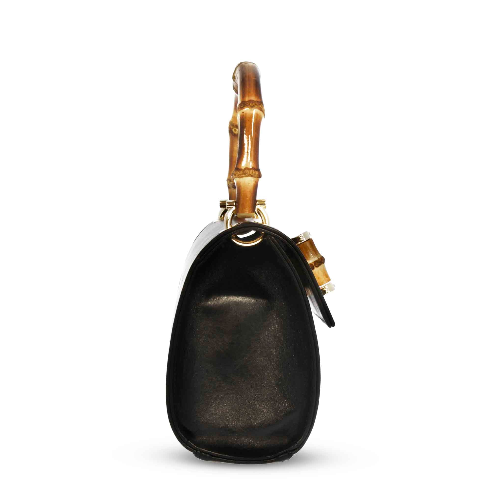 Borsa a mano artigianale da donna in pelle nera con manico bambù