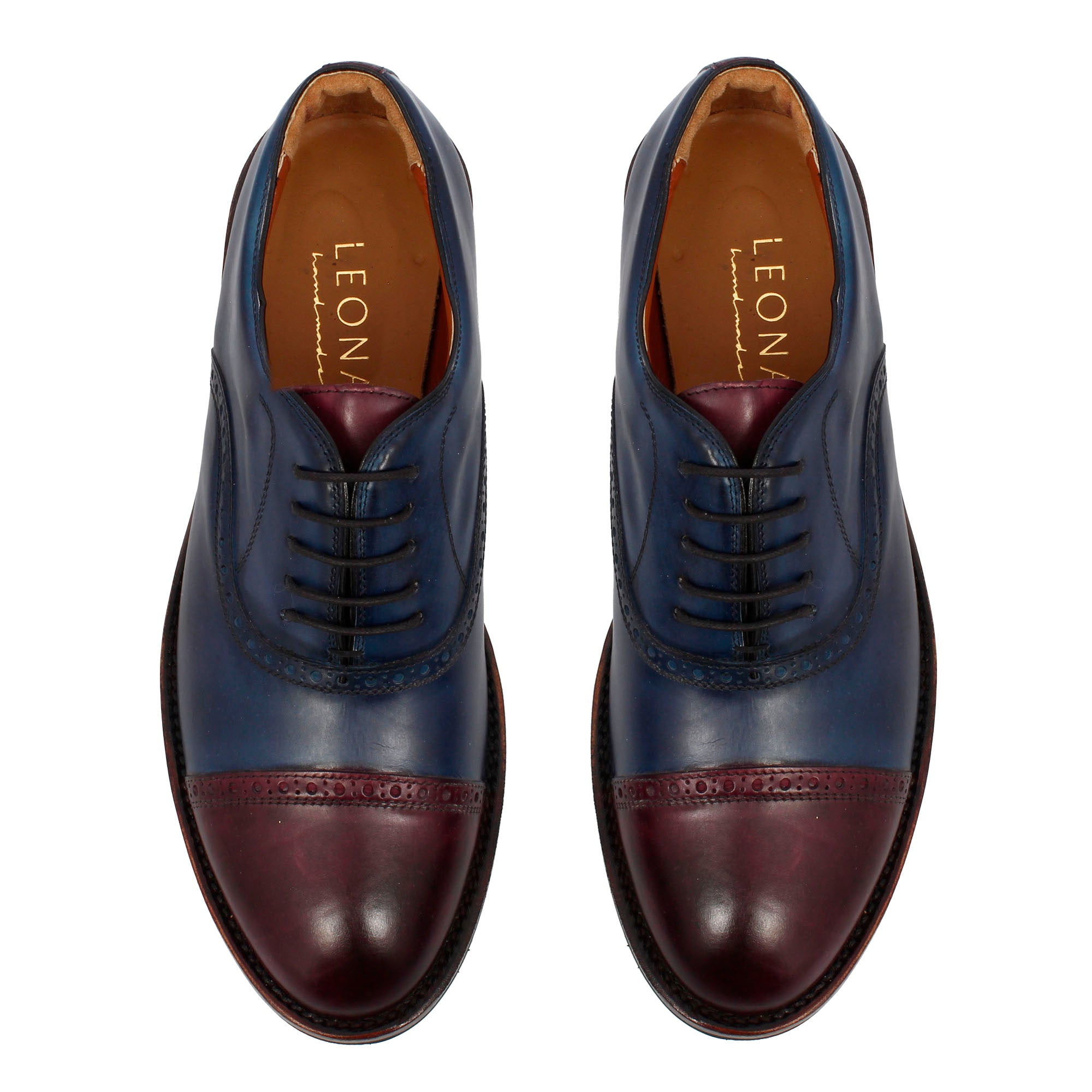Handcrafted golf shoes in hand-dyed blue and burgundy leather