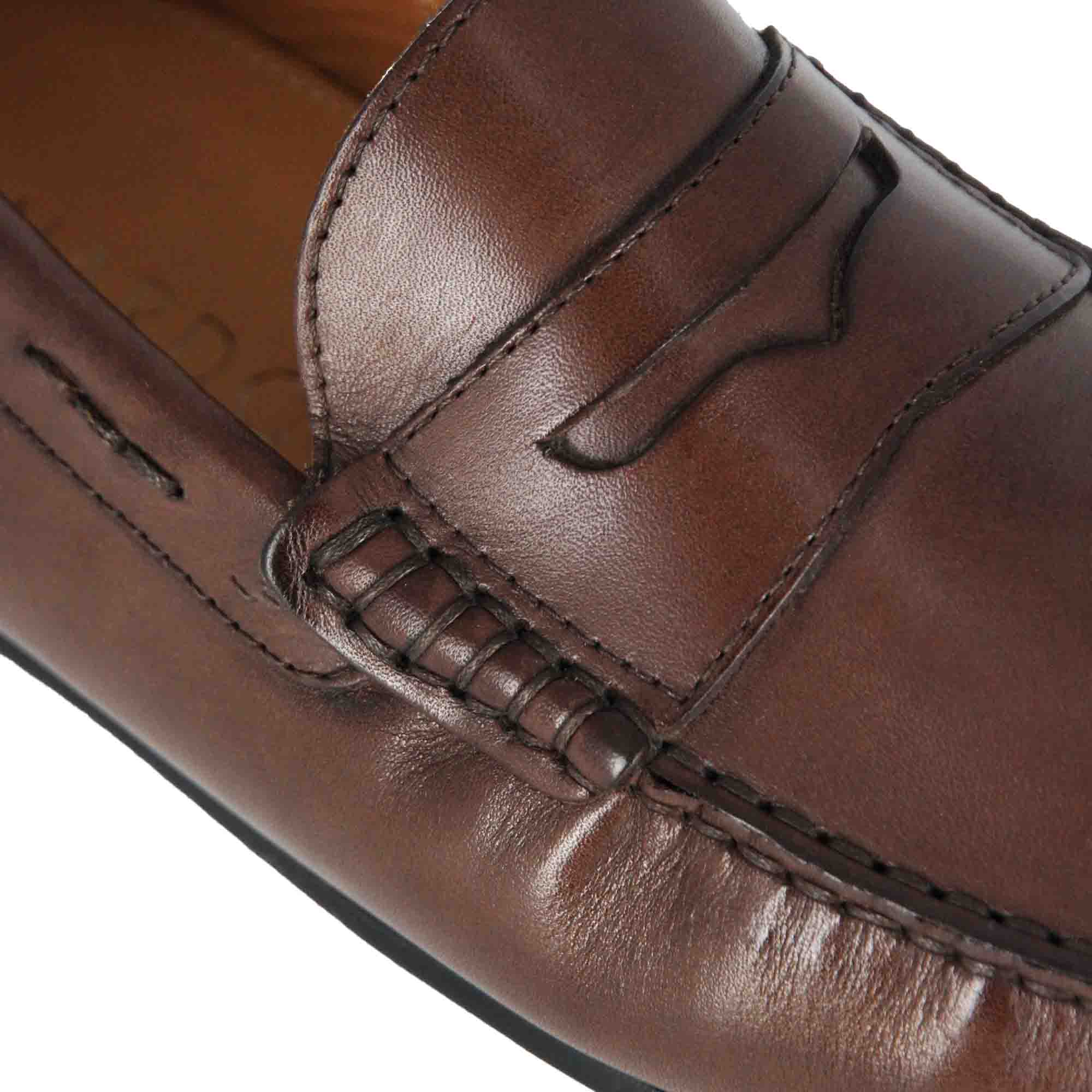 Casual men's moccasin in dark brown leather with rubber pebbled sole
