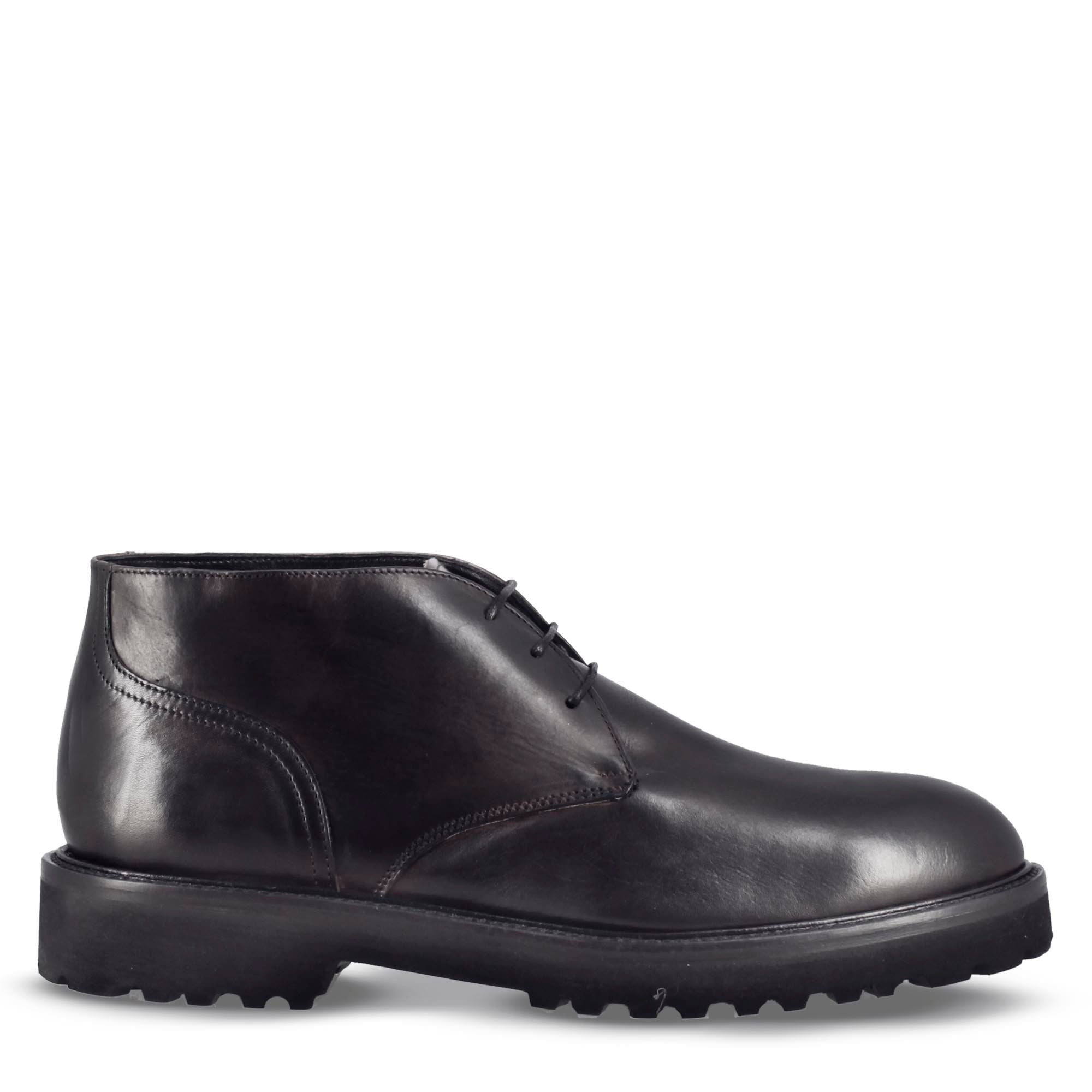 Men's ankle boots in smooth black genuine leather with lug sole