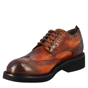 Women's derby with paupa brogue details in dark tan washed leather