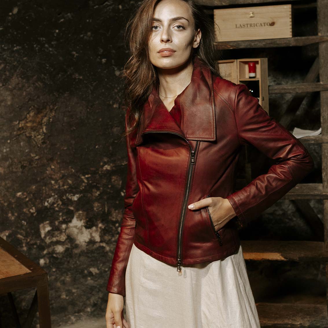 Women's burgundy leather jacket with high collar and double breasted