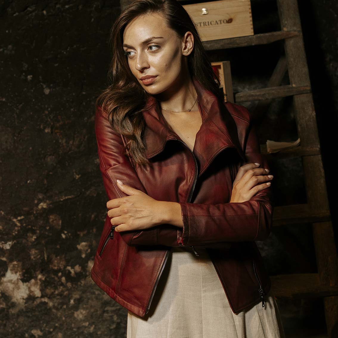 Women's burgundy leather jacket with high collar and double breasted