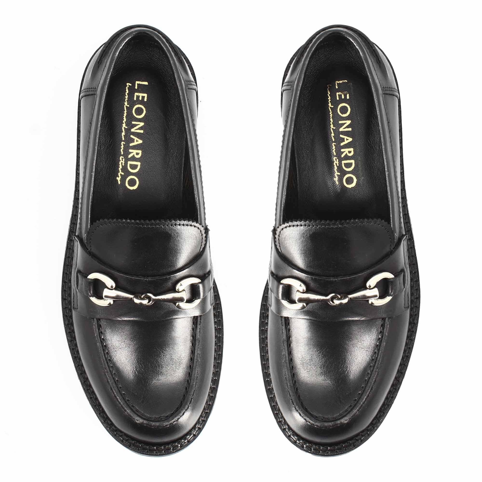 Women's loafer with sturdy black leather sole and buckle