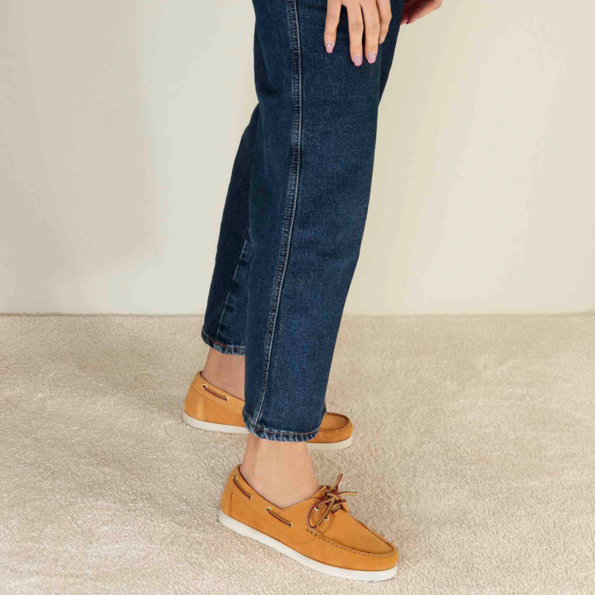 Women's boat moccasin in yellow suede