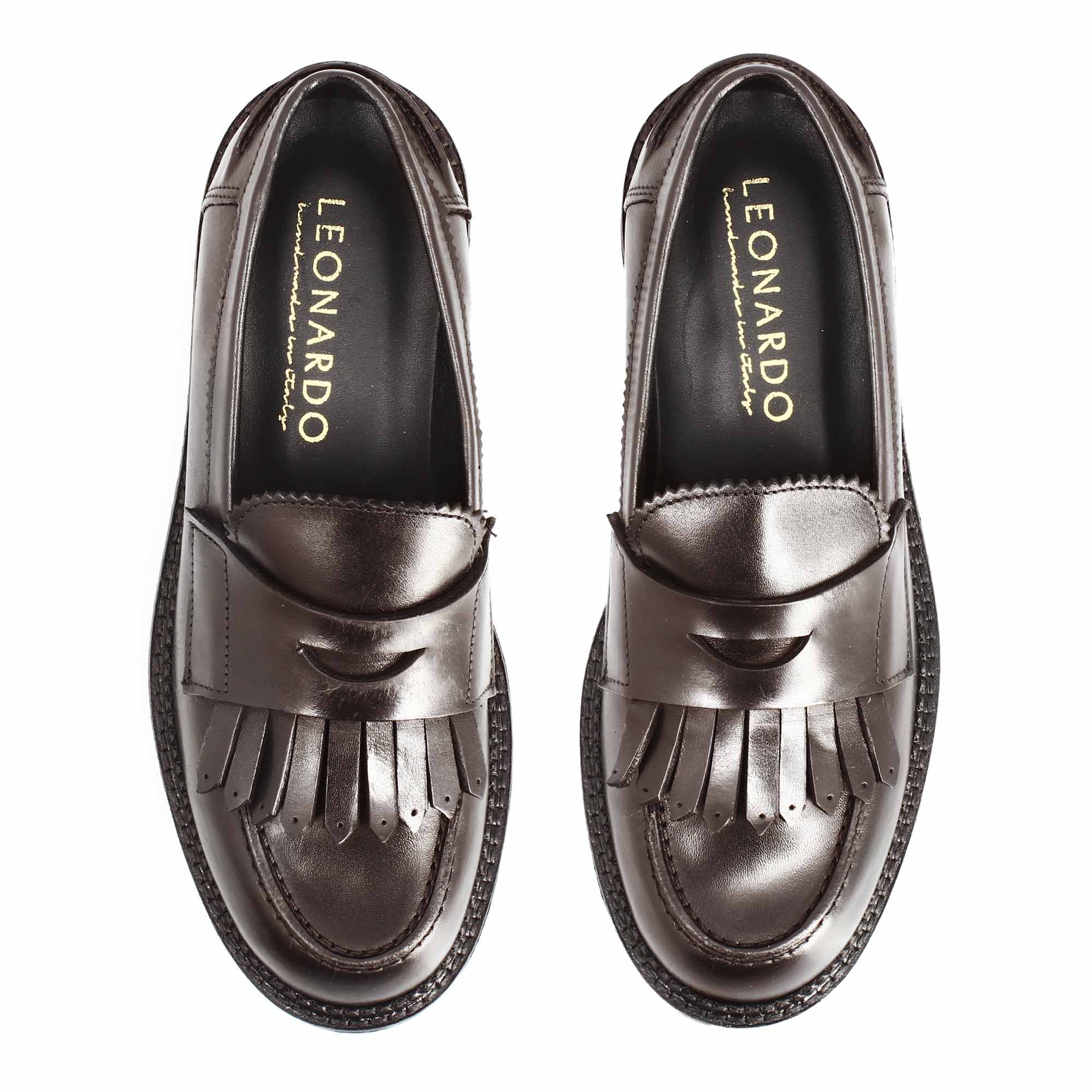 Women's moccasin with sturdy sole in dark brown leather and fringes