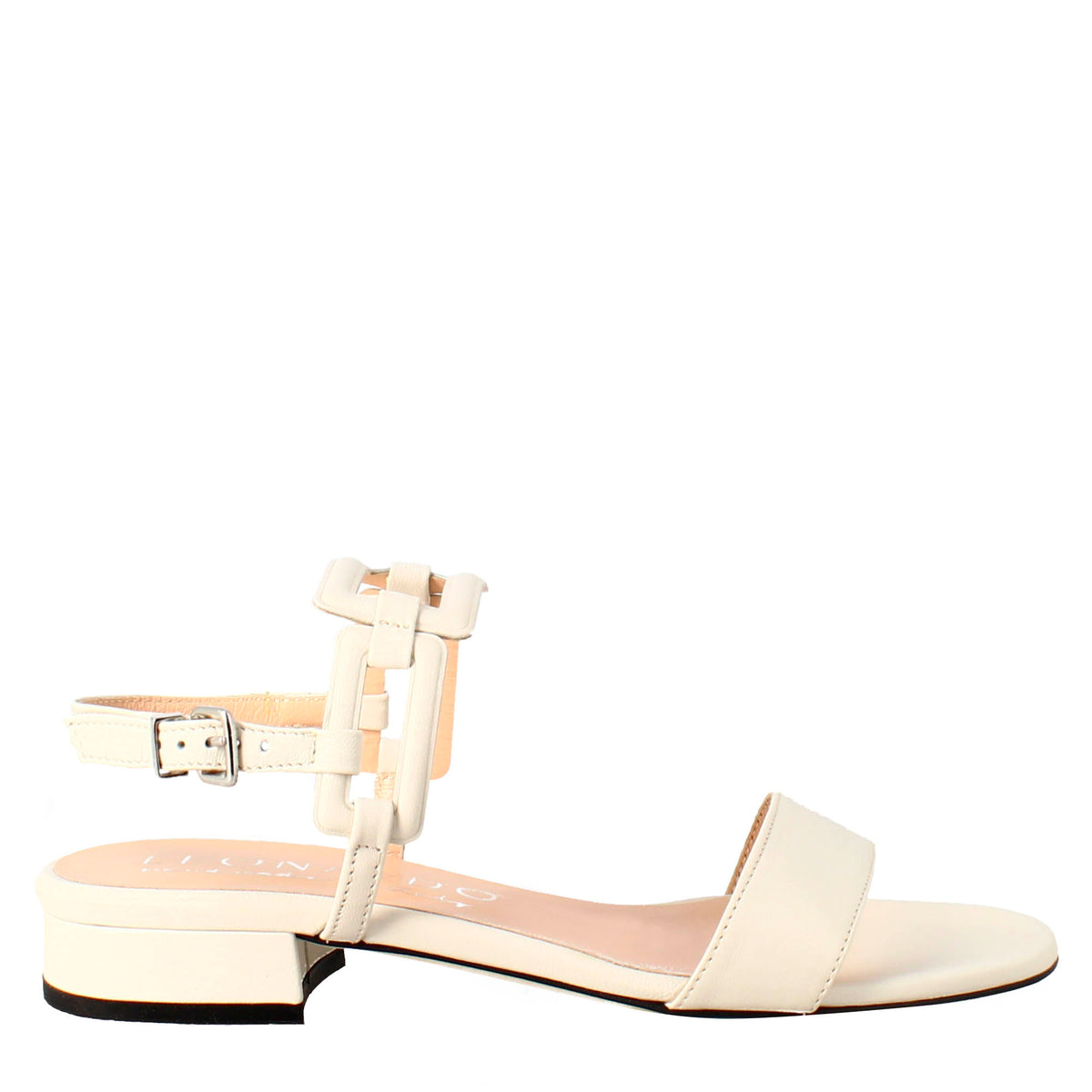 Woman's open sandal with low heel in cream leather