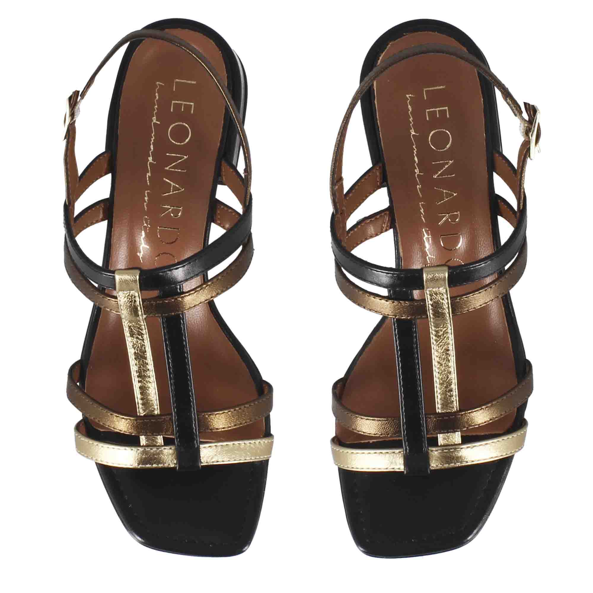 Women's sandal with black and gold leather bands