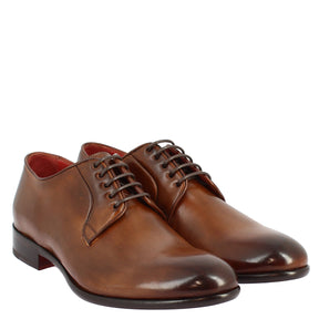Men's handmade lace-up shoes in brandy leather