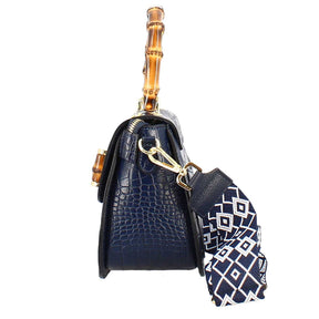 Handmade women's handbag in blue leather with removable shoulder strap