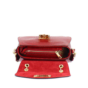 Handmade women's handbag in burgundy leather with removable shoulder strap