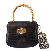 Handmade women's handbag in black leather with removable shoulder strap