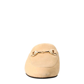 Woman's mules in beige suede with gold buckle